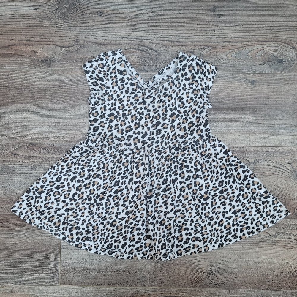 Leopard Criss Cross Back Peplum Top